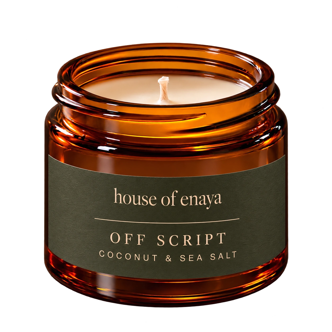 House of Enaya OFF SCRIPT candle, 80ml amber jar with its new collection label
