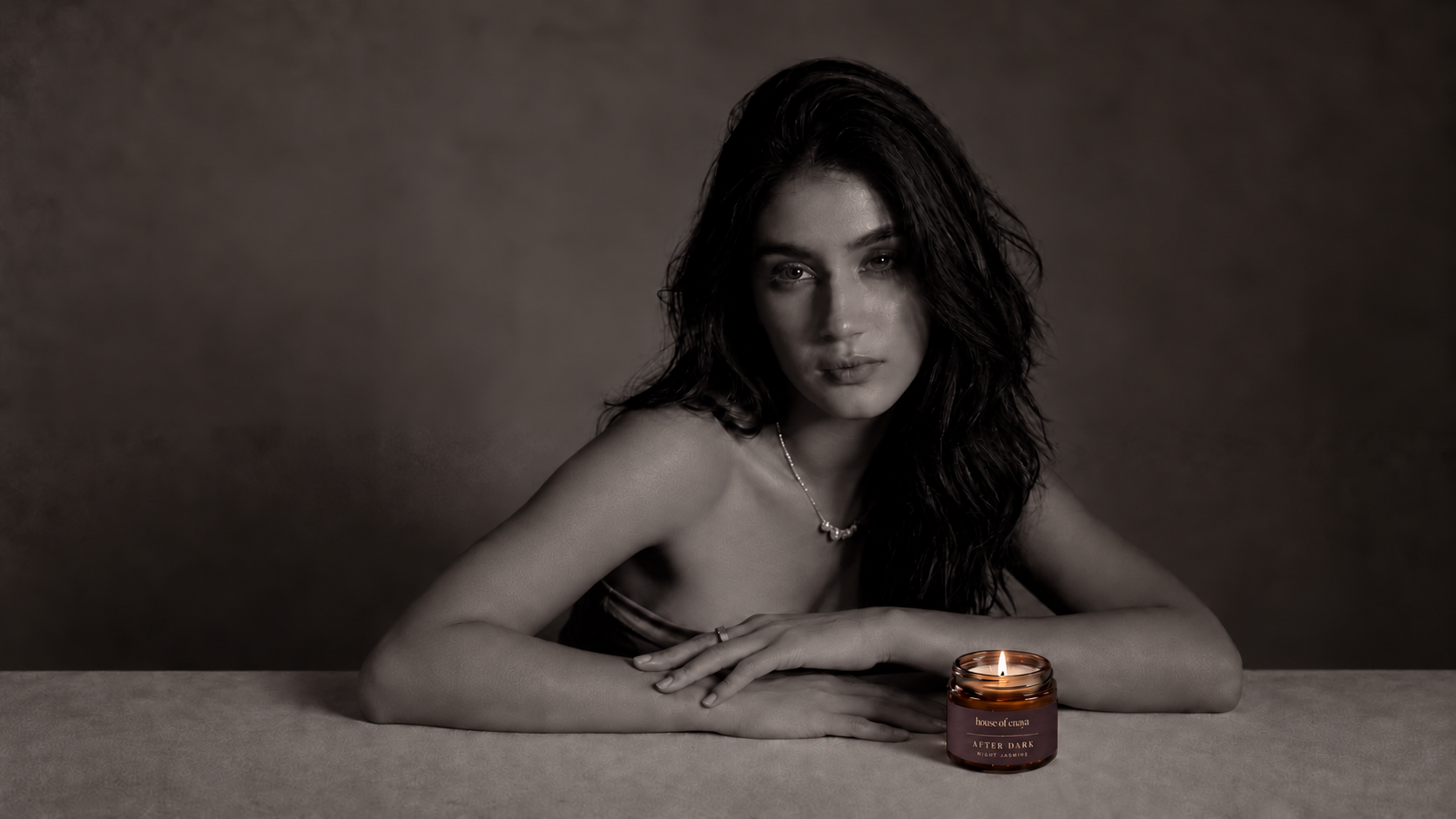 Enaya with the AFTER DARK candle